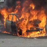 auto elettrica in fiamme